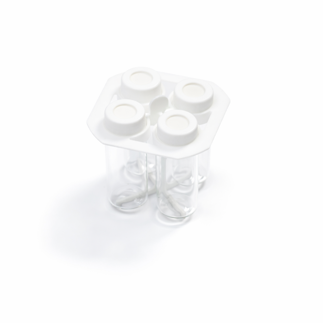 White silicone ice cube tray with four compartments on a white background